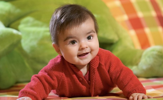 Over time, your baby will use her arms more during tummy time.