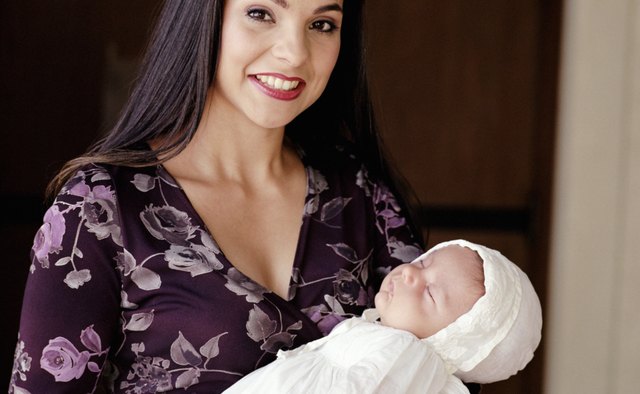 It is traditional to dress the baby in white.