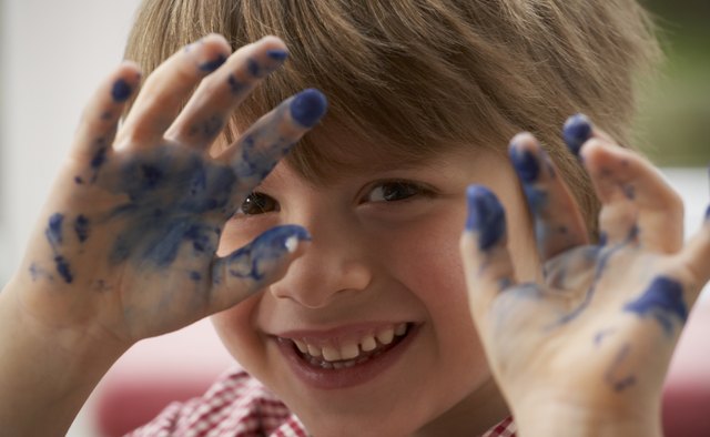 Finger painting is a go-to toddler activity.