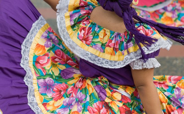 Mexican dancers perform outside.