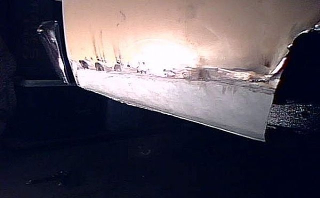 New metal spot welded and screwed in place.