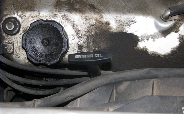 Engine oil cap and dipstick