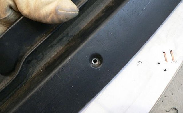 Rivet removed