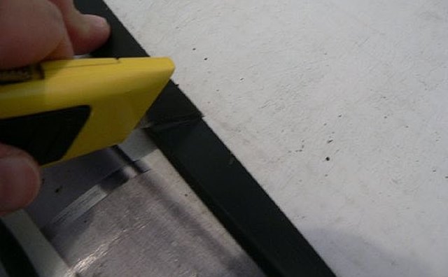 Putting the new tacking strip in place
