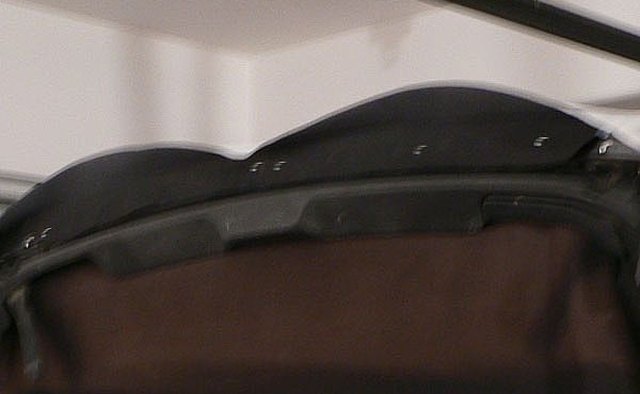 Lining stapled to front bar