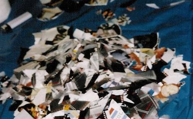 Ripped photos are evidence of aggressive anger (photo by Matthias Sebulke/Wikimedia Commons)