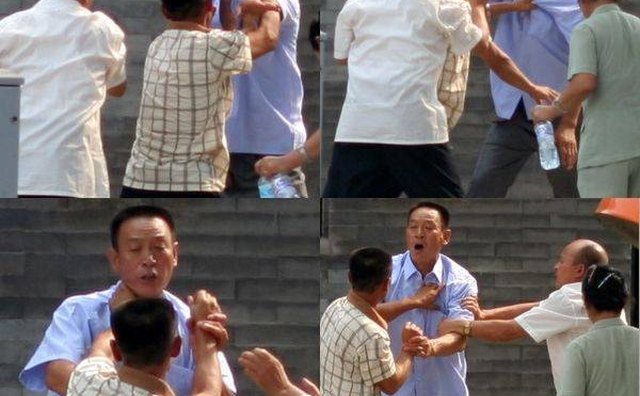 Street fight (photo by Ernie/Wikimedia Commons)