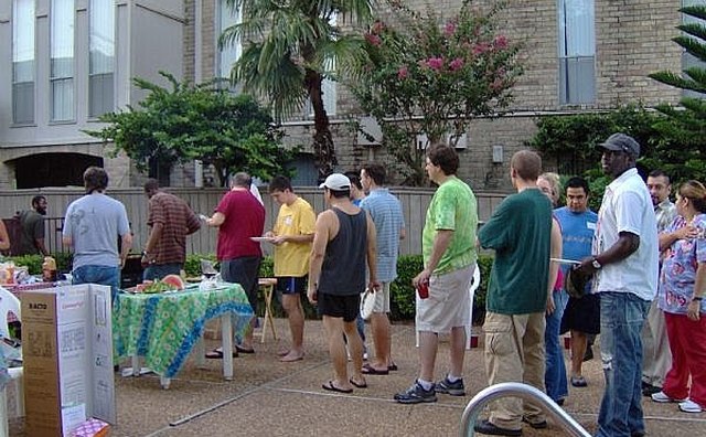 Lots of people line up for good food at a National Night Out Party.