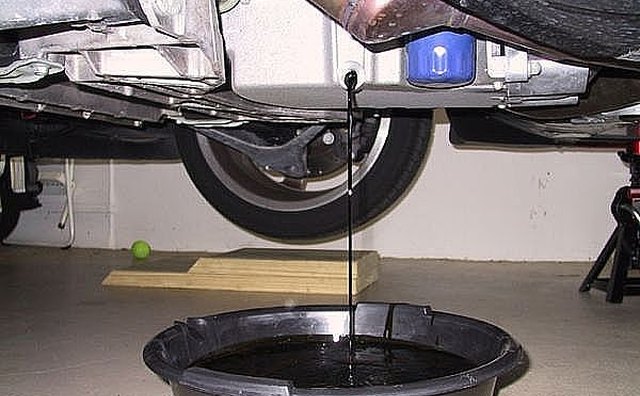 Let the oil drain into the oil pan