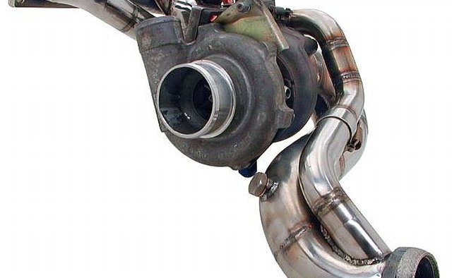 Turbo header with turbocharger attached
