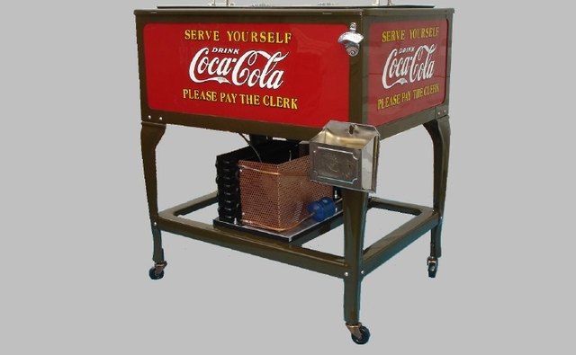 No coin operation yet on this Coke machine as the buyer had to give his nickel to the clerk