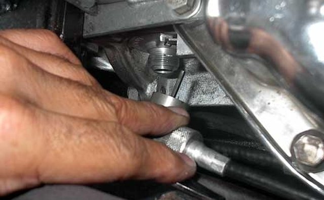 Loosen the Lock Nut, Pull the Cable and Wrap the End