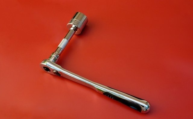 Use a ratchet wrench to loosen the mounting bracket