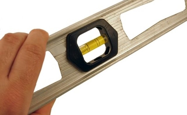 A level can help you determine the lift angle to calculate gas spring loads.