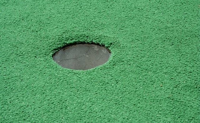 Mini golf is fun for boys and adult leaders alike.