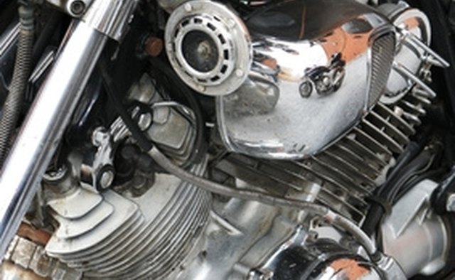 A close-up shot of the left side of the engine; the gear shift lever is a small, round peg visible in the lower center-right portion of the photo.