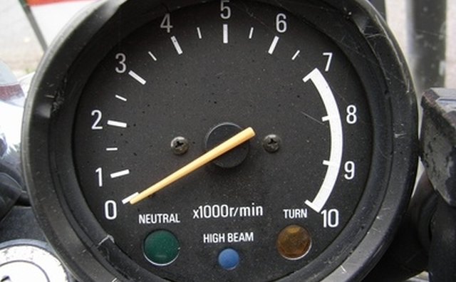 A motorcycle tachometer with a neutral indicator.