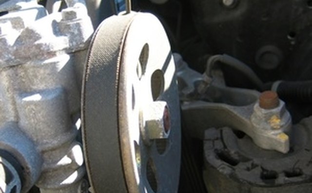 You can find the timing marks notched on the end of pulleys.