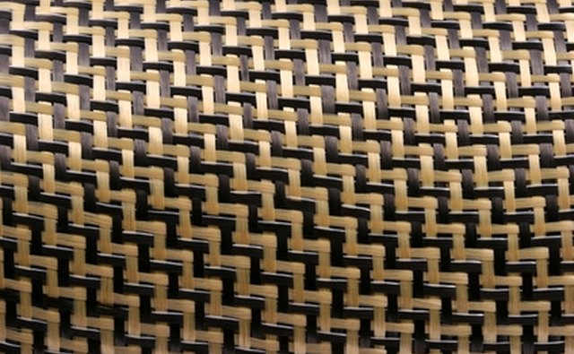 Carbon fiber cloth also comes in a Kevlar blend.