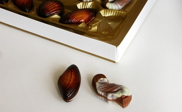 A box of chocolates is a delicious gift for food-loving parents.