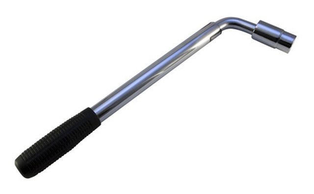 Use the wheel nut wrench to remove the tire.