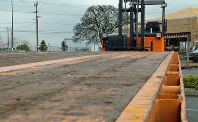 This picture illustrates the safety rail of a flatbed trailer.