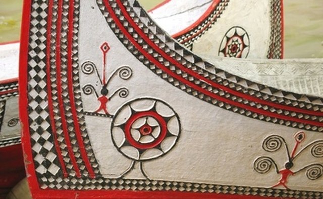 Canoes were often adorned with carvings and paintings.