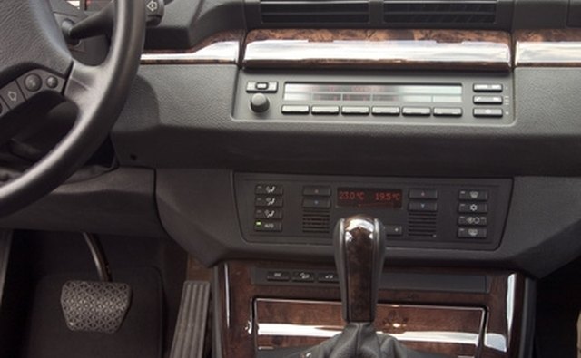 Look for the 4WD button or shifter.
