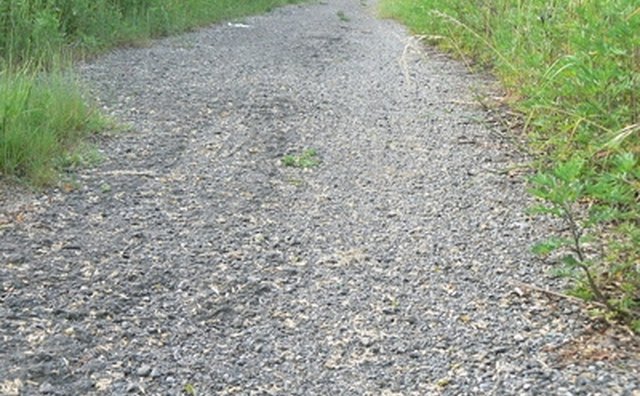 A loose surface of gravel, sand or grass is the best test site.