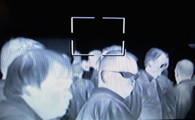 In this IR image, it's easy to see that the visibly transparent eyeglasses are opaque to infrared.