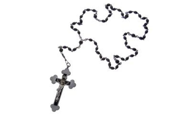 The objects you place at your altar can include figuines, jewelry or religious items.