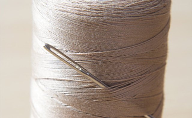 Since you must gather the fabric tightly, use a string that will not break easily.