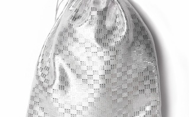 A silver gift bag can add a sparkling touch to a 16th anniversary gift.
