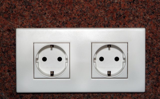 Childproofing a nursery includes the important step of covering all electrical outlets.