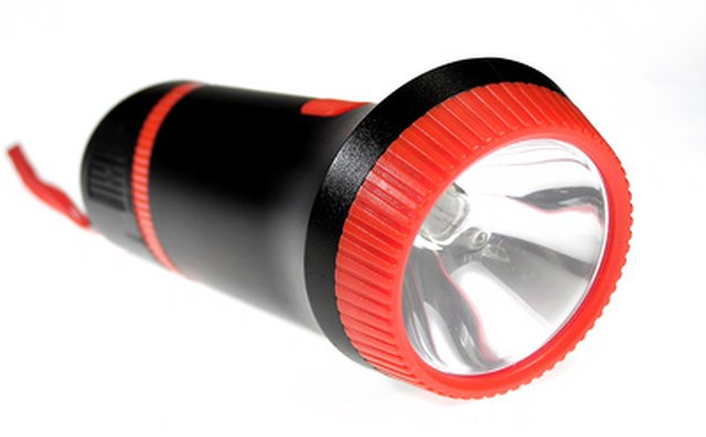 A flashlight can help locate a head code number when it's stamped on the side of the head.
