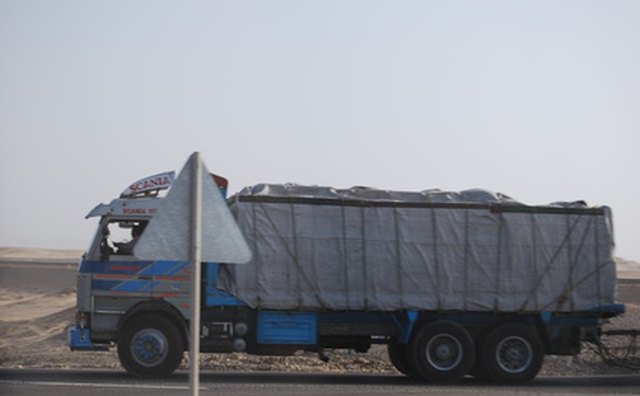 Tandem trucks have two axles in the rear.