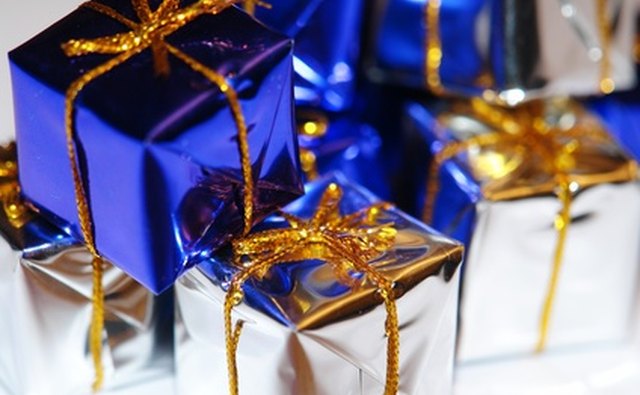 Wrapping a tiny gift for each year is a creative way to celebrate a 16th wedding anniversary.