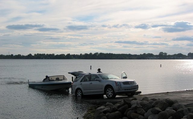 If you are on an incline, engage the parking brake before shifting into park.