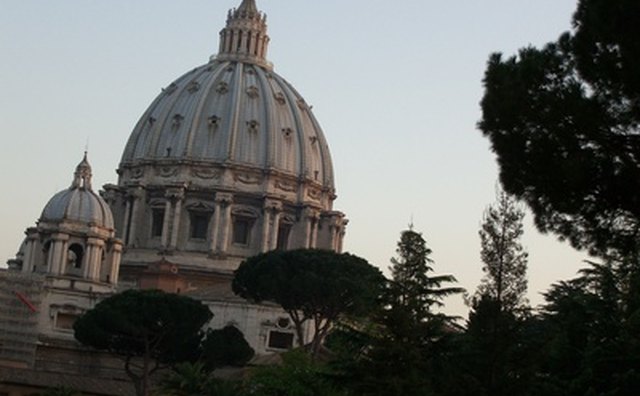 Offer a Roman Catholic headstone blessing.