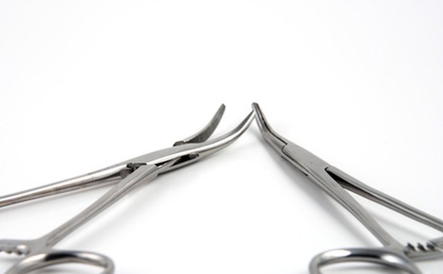 Forceps can help pull out stubborn vent clogs.