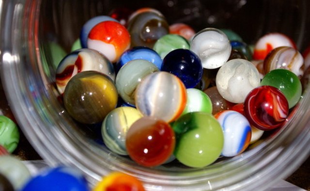 Kumo entails encasing pebbles or marbles into the fabric before dying.