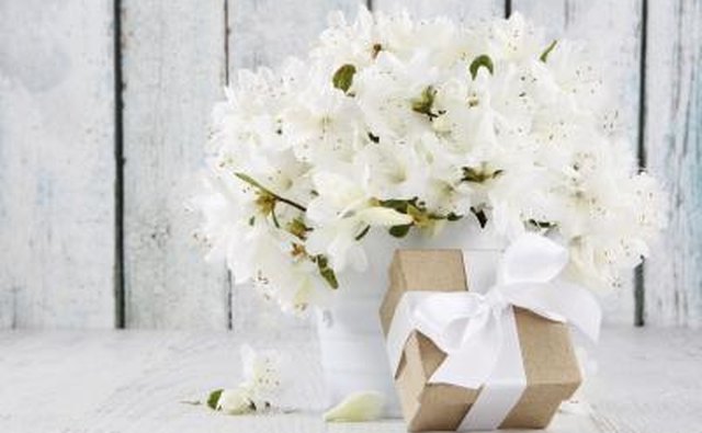 White bouquet of flowers on table.