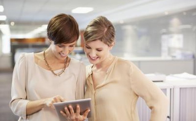 The Kindle is a hand-held device that you can use to read books, newspapers, magazines and blogs.