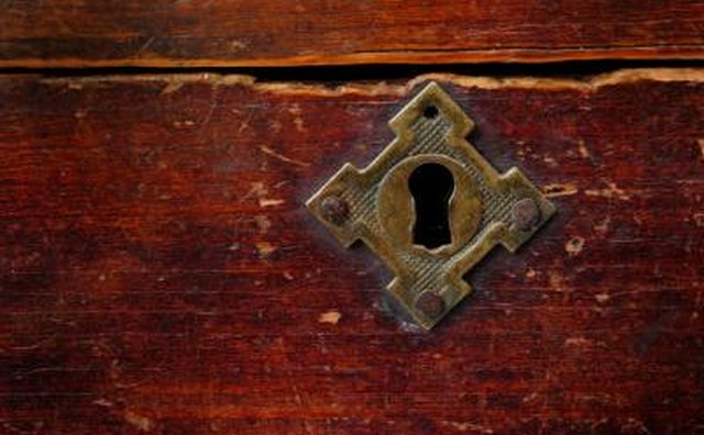 A close-up of a box with a key hole.