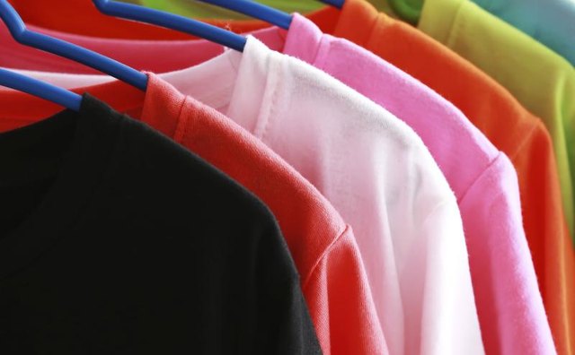Close-up of t-shirt rack.