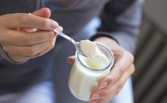 Woman eating yogurt