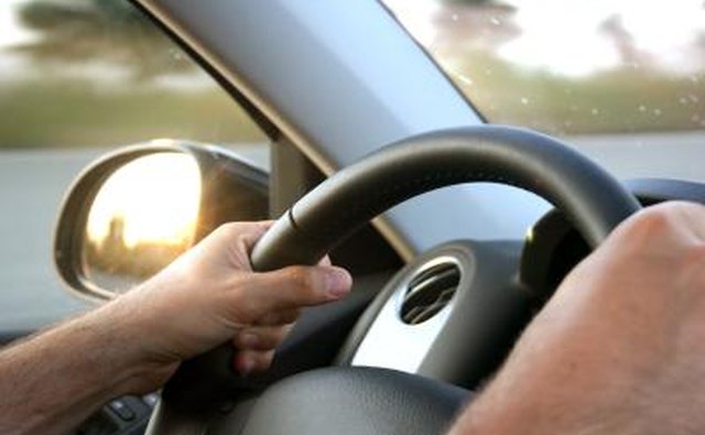 Woman steering car