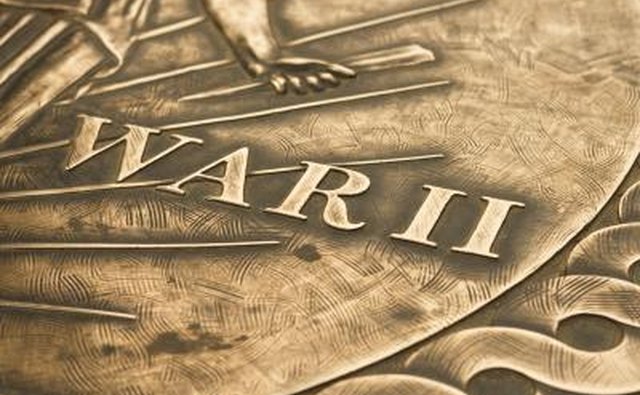 Don't worry about removing every bit of patina; concentrate on the flat and raised surfaces.