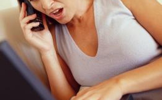 Woman frustrated at her computer