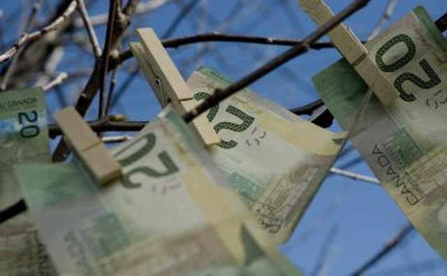Place an small undecorated Christmas tree on a table and encourage people to pin money to the tree.